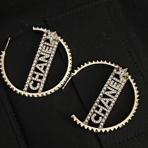 CHANEL Gold and Silver Star Hoop Earrings